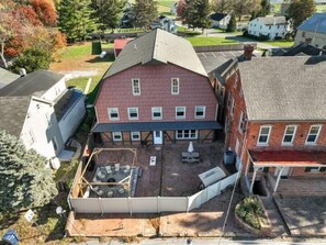 View of the back of The Barn with private courtyard