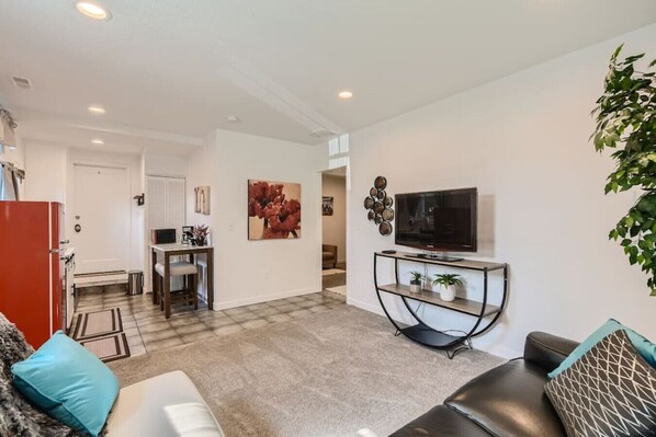 Cozy Living Area with a Glimpse of the Intimate Kitchenette Corner