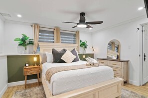 Welcome to your Irie Rest - Drift into island dreams on a plush queen bed in this serene sanctuary...