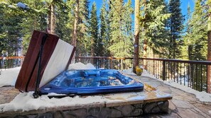 Take in the scenic surroundings while you ease sore muscles in the hot tub located on the upper floor deck.