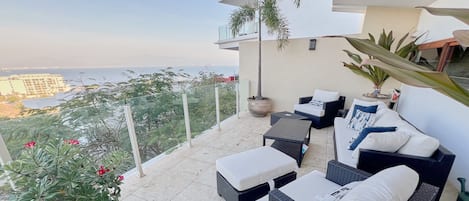 Private outdoor living space with views of the bay and Marina Riviera Nayarit
