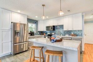 This updated kitchen provides plenty of space to cook your favorite meals!