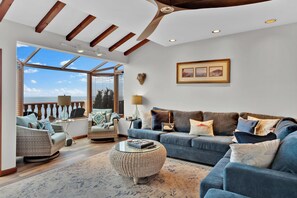 Open living room with beautiful ocean view. 