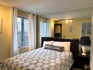 Downstairs bedroom with queen bed