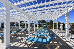 Relax under the shade of the Clubhouse Pergola
