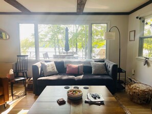 The view of the pond and deck from the living room.