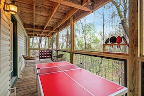 Smoky Mountain Game Den's deck with ping pong table