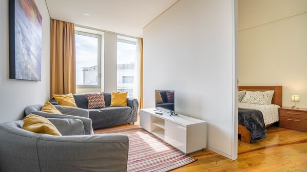 Your retreat awaits! Step into our sunlit living room, where every corner invites you to kick back and relax. #SunshineSpaces #UnwindInStyle