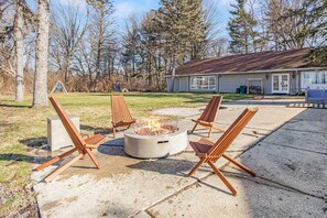 Serene backyard fire pit for starlit evenings.