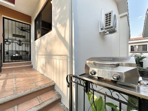 The unit has a private BBQ grill, just steps from the front patio.