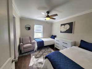 3rd bedroom with 2 Twin Beds, Swivel/Rocking Chair and dresser. 