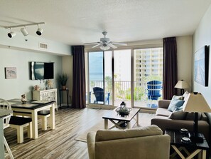 Sunset Condo Living Room View to Beach & Resort