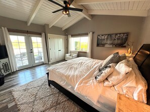 Master Bedroom with French doors to Hot Tub