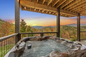 Unwind in the warm embrace of the hot tub as you take in the stunning mountain sunset. Afterwards, gather the whole family around the fire pit for some s’mores and unforgettable moments under the stars.
