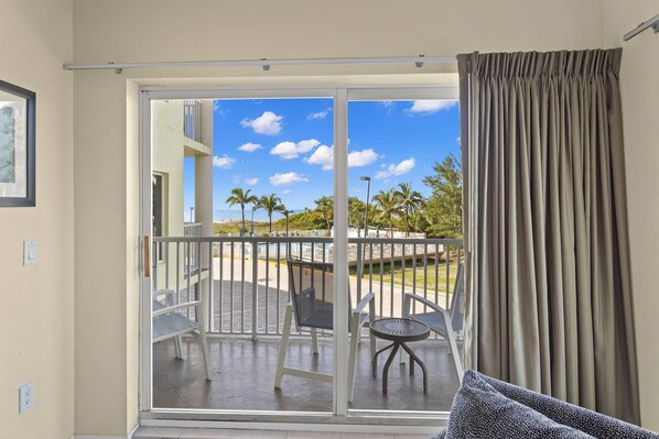 Private Northwest facing balcony overlooking the pool and Gulf, with exceptional views of the nightly sunsets