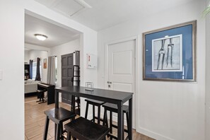 Bar table with 4 stools.