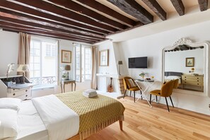 The open-plan bedroom and dining area