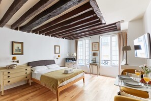 The open-plan bedroom and dining area