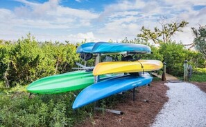 5 kayaks to use in the channel right behind the house