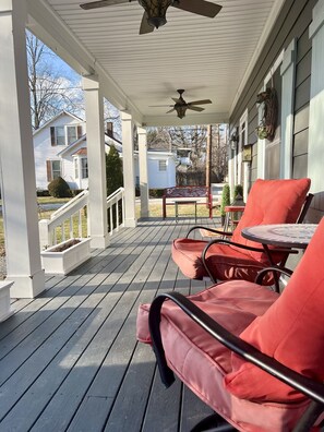 Huge covered front porch deemed, "the best room in the house."