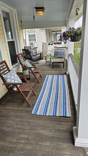 Front porch with swing and plenty of seating