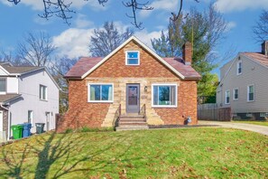 Welcome home: The front of the house, a warm and inviting entrance that sets the stage for comfort, hospitality, and a place to create lasting memories.