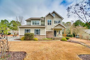 House Exterior | Outdoor Dining Area | Porch w/ Lounge Seating