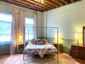 King bed in separate large bedroom, dressers, closet, fan, space heater