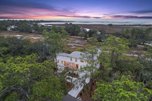 Aerial view of the house at sunset