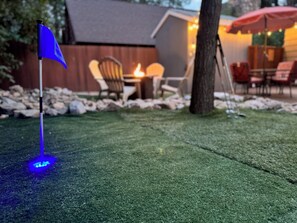 Need to work on your short game? Enjoy a little putting in the backyard. 