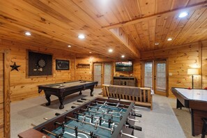Indoor Game Room with Air Hockey, Pool Table, Foosball Table, and Media Space