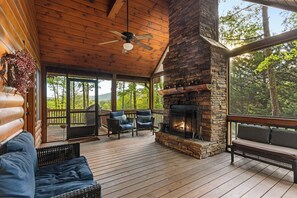 Outdoor Fenced-In Lounge Area with Fireplace