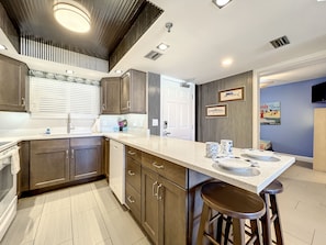 Breakfast bar with 2 extra stools.