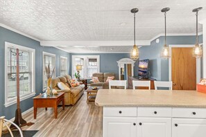 Front unit open concept kitchen and living room