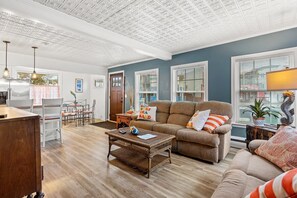Living room with smart TV with ability to log into personal streaming platforms
