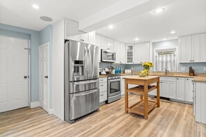 Fully equipped kitchen with updated appliances