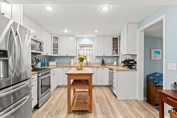 Fully equipped kitchen with updated appliances