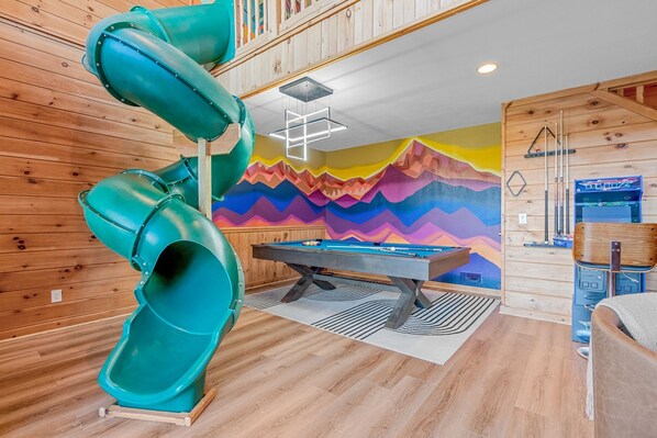 Slide your way into the heart of the game room!