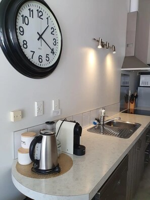Full kitchen with nespresso coffee machine