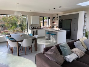 Living room with dining and kitchen