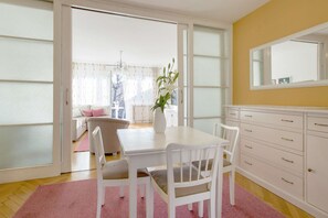 View from the dining area on the living room and the terrace.