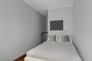 Bedroom on the upper level of the apartment
