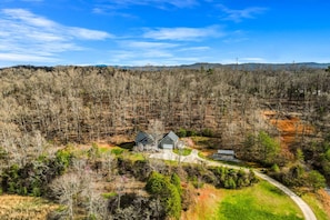 The house is located on a private hill in a quiet neighborhood in Kodak, TN.