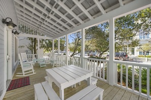 GENEROUS OPEN AIR PORCH AT FRONT W/OUTDOOR SEATING