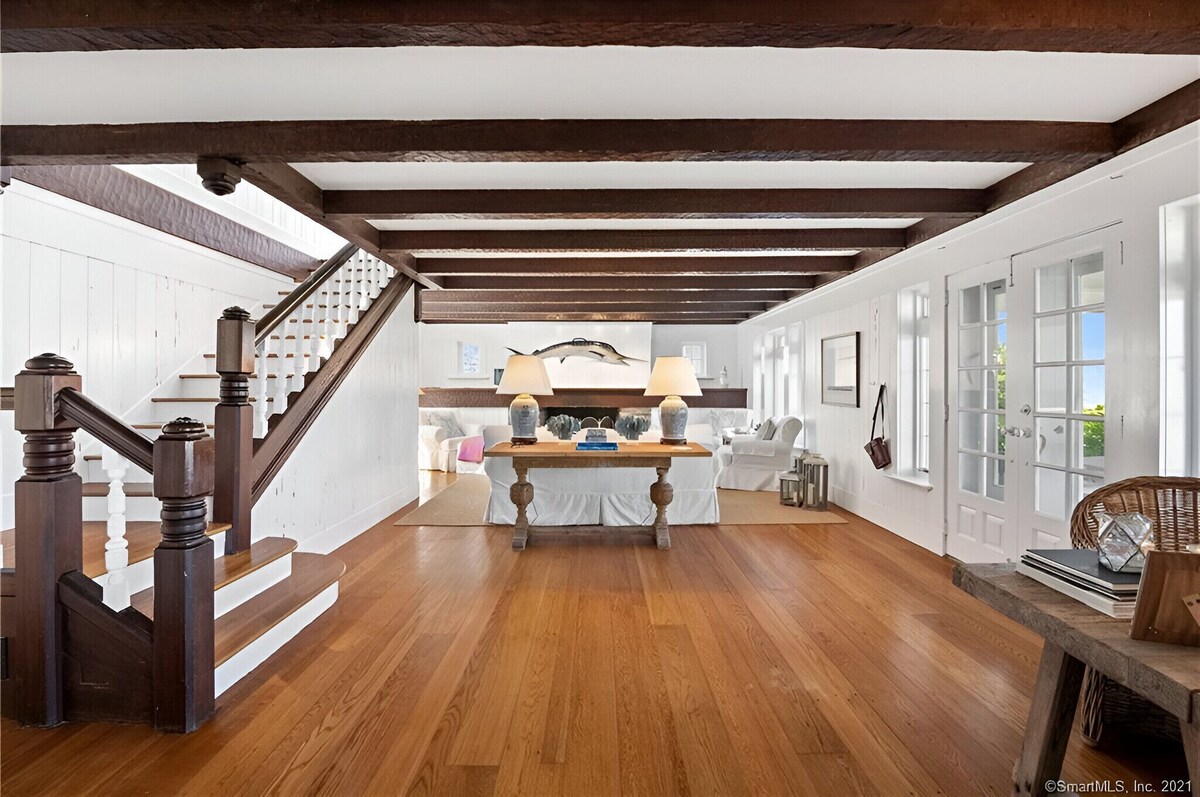 Oceanfront home with private dock & large yard