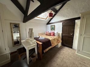 The Living Area: relax and have a peaceful nights sleep in the double bed, with fresh linens and towels for every stay.  There is also a great little dressing table making it easy to get ready for a night out in Chester.