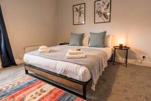 Upstairs Master bedroom:  Super spacious bedroom with King bed.  The perfect space to unwind.