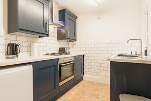 Modern Kitchen - shaker style, small but practical.