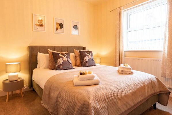 Bedroom 2: have a restful nights sleep in the king-sized bed complete with fresh linens.