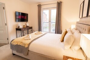 Master Bedroom with En-suite: our fantastic king-size master bedroom has plenty of natural light, a smart TV and an en-suite - what more could you ask for?!